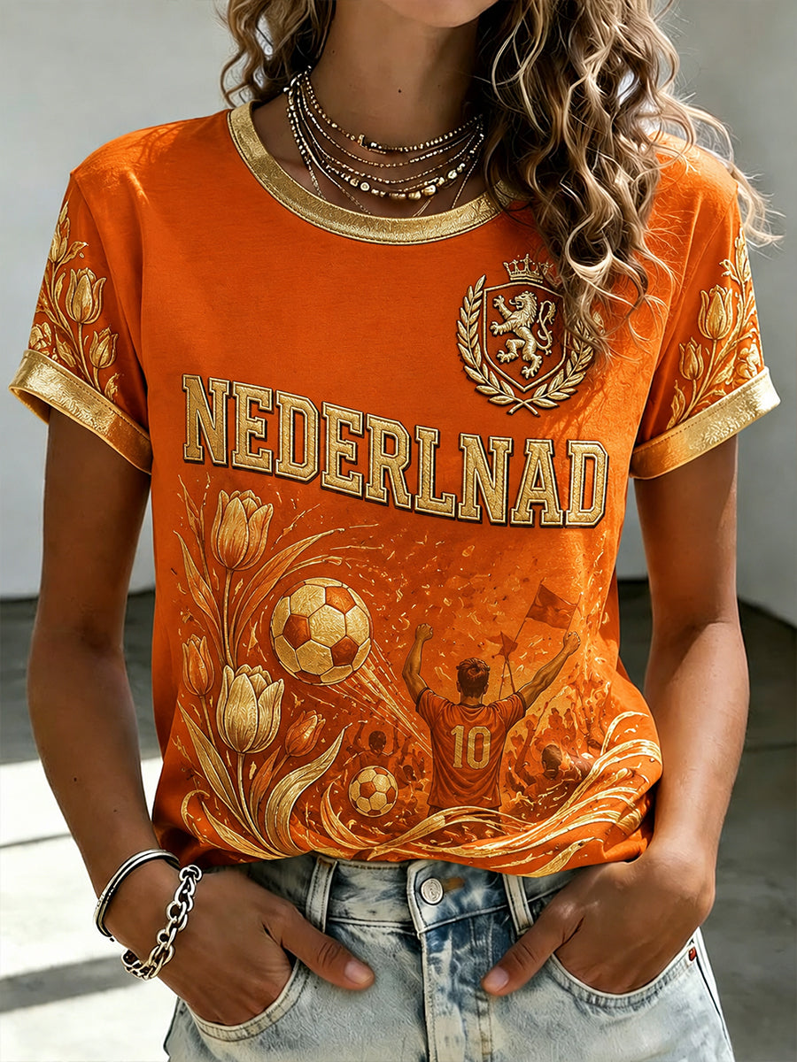 Dames-T-shirt met korte mouwen en print van een leeuw en een voetbal
