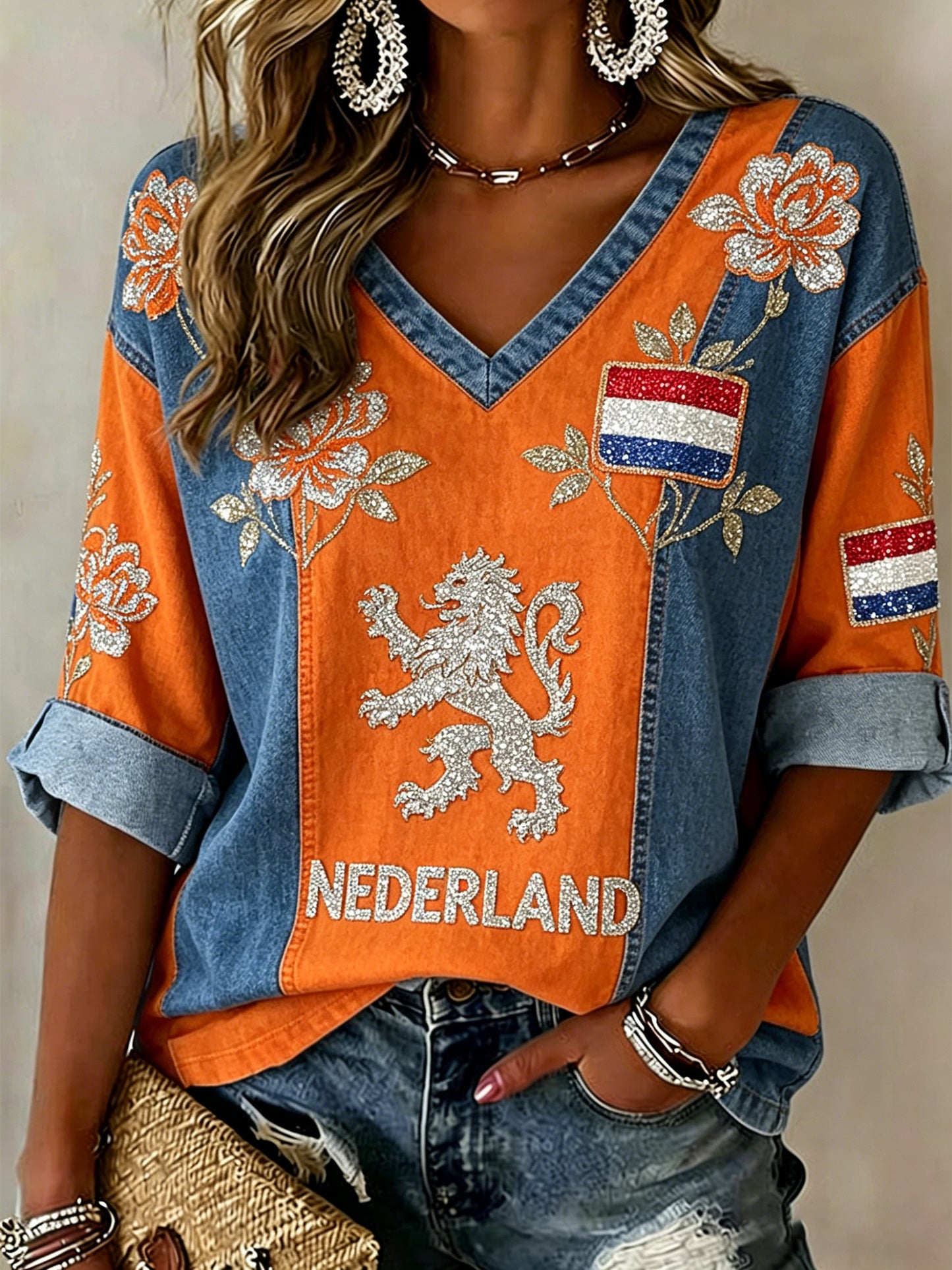 Casual damestop met V-hals en paillettenprint van een leeuw en bloemen