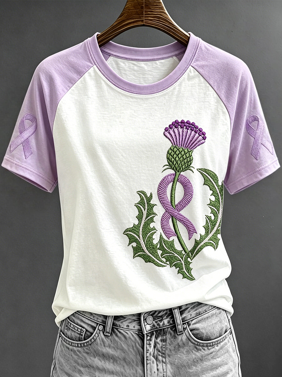 Paars lint voor dames Schotse distelprint T-shirt met contrastmouw en ronde hals