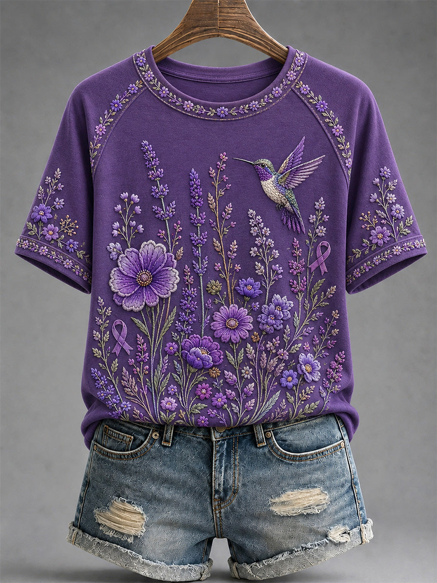 Dames-T-shirt in paars met bloemen- en kolibrieprint ter ondersteuning van het bewustzijn rond Alzheimer