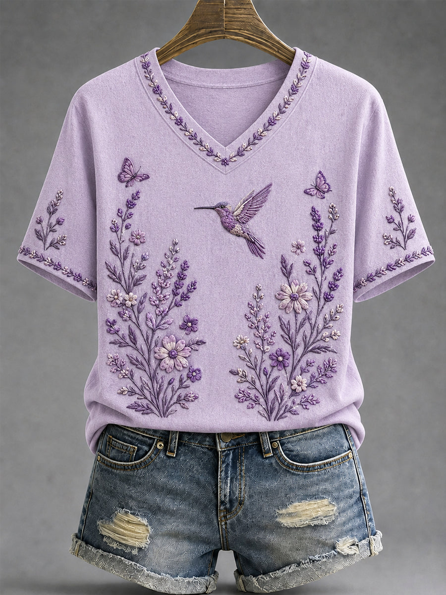 Dames-T-shirt met paarse bloemen- en kolibrieprint ter ondersteuning van het bewustzijn rond Alzheimer, met V-hals
