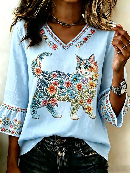 Damescasualtop met bloemen- en kattenprint