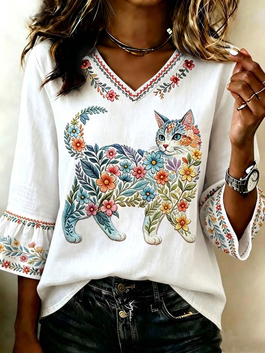 Damescasualtop met bloemen- en kattenprint