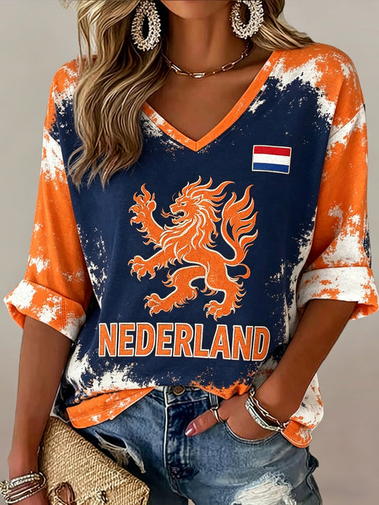 Dameskunstprint met V-hals ter ere van Koningsdag in Nederland