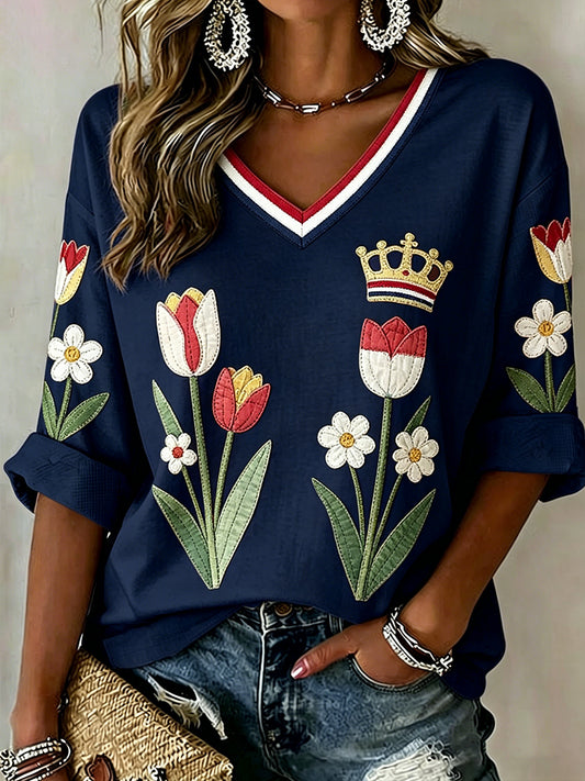 Damesblouse met bloemenpatchworkprint en V-hals