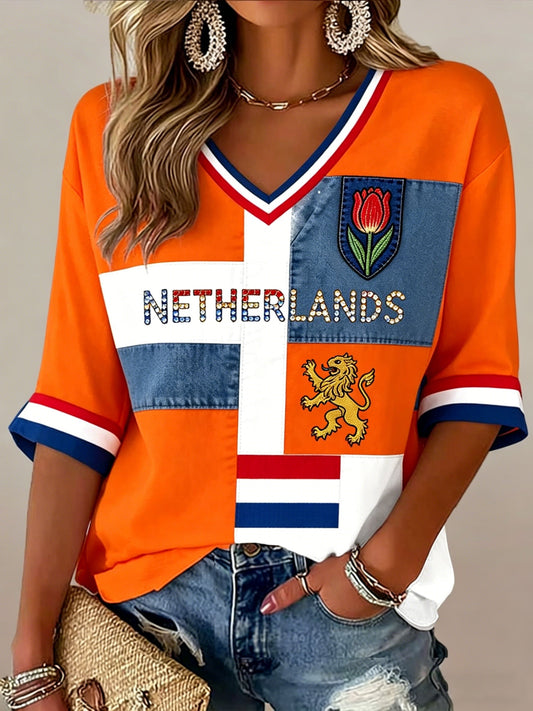 Dameskunstprint met V-hals ter ere van Koningsdag in Nederland
