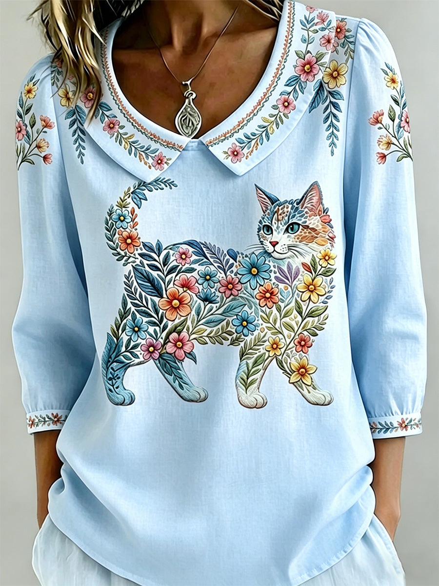 Damescasualtop met bloemen- en kattenprint