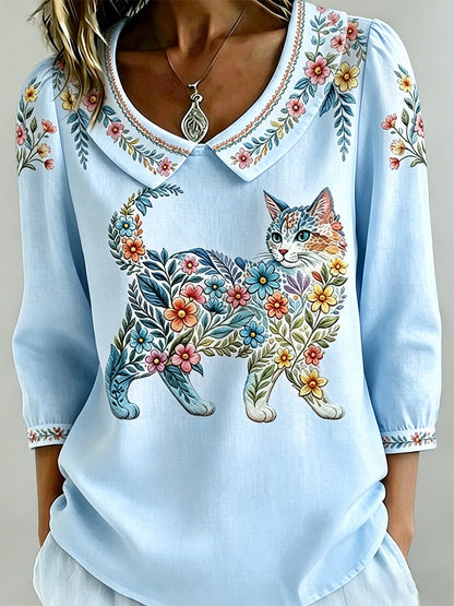 Damescasualtop met bloemen- en kattenprint