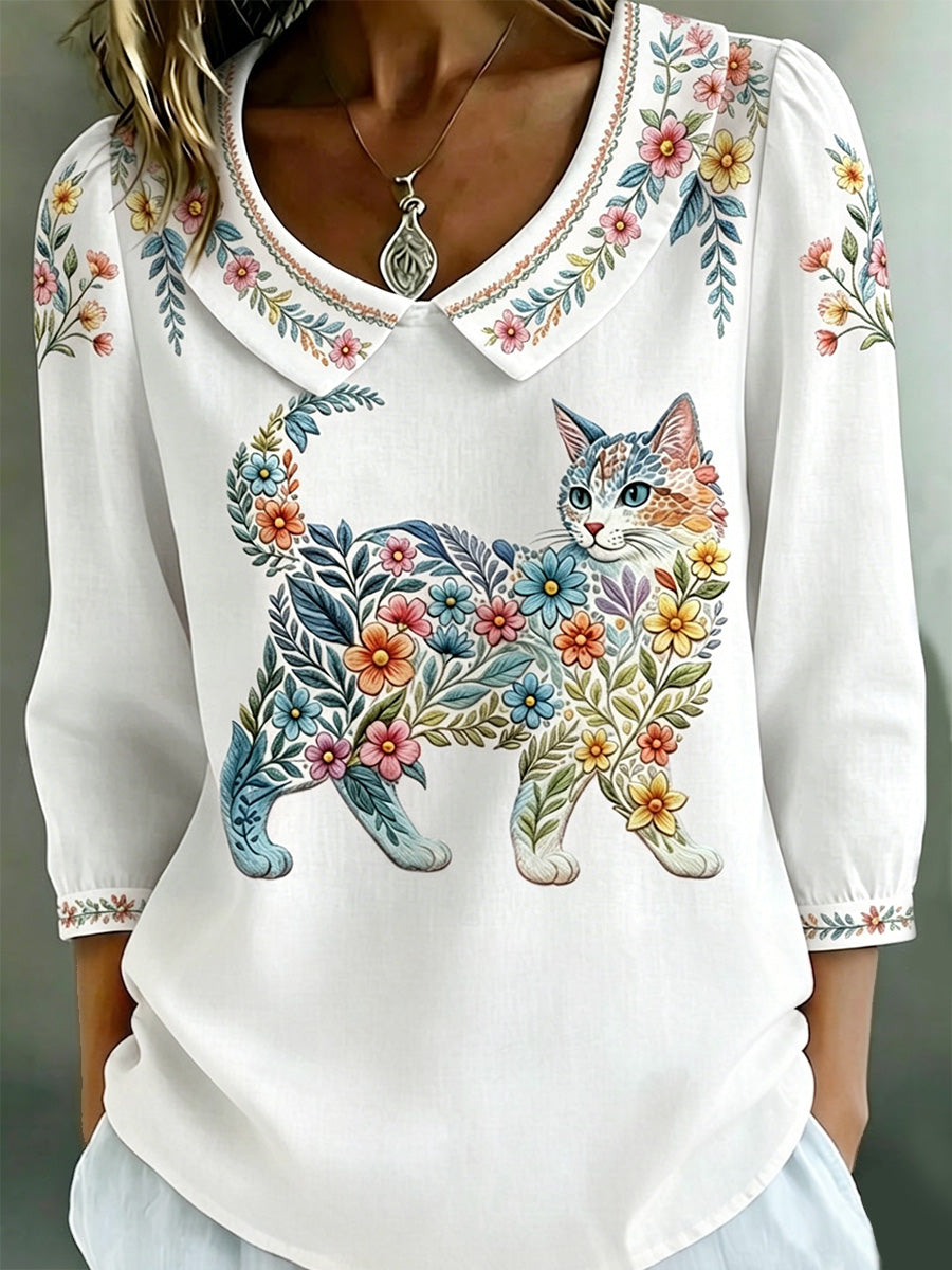 Damescasualtop met bloemen- en kattenprint