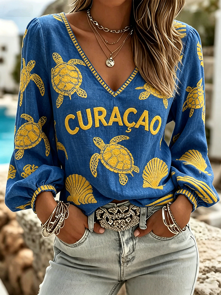 Dames met lange mouwen V-hals top met schildpad en schelp print