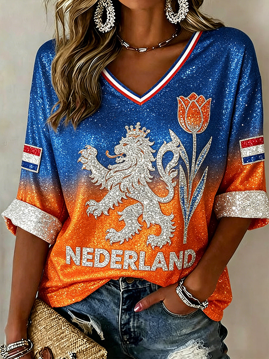 Dames lovertjes leeuw en bloemenprint met V-hals top