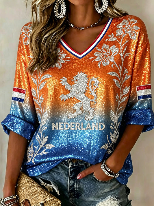 Dames casual v-hals top met lovertjes leeuw en bloemenprint