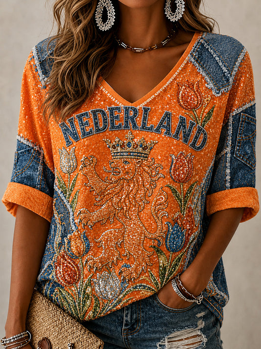 Damesblouse met lovertjes, leeuwen- en bloemenprint, denim patchwork en V-hals