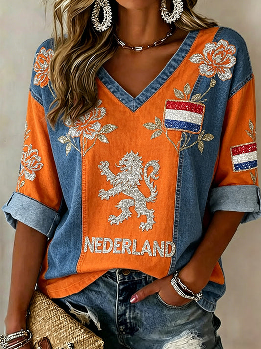 Casual damestop met V-hals en paillettenprint van een leeuw en bloemen