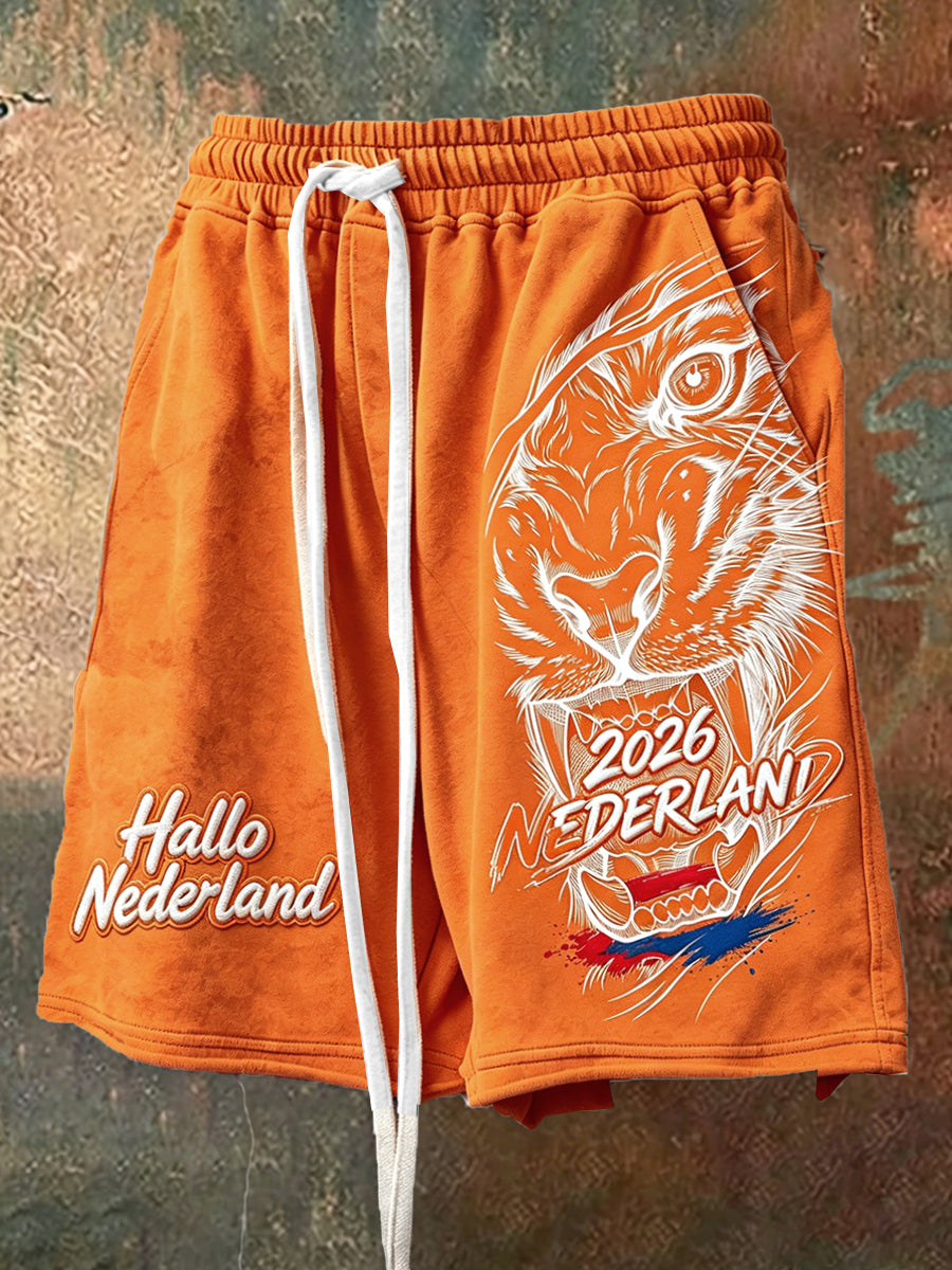 Oranje voetbalprint sportkorte broek voor heren met casual trekkoord