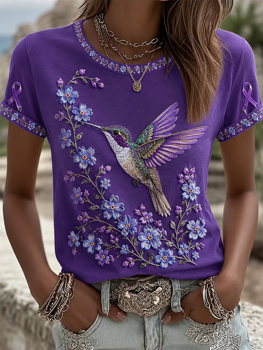 Dames-T-shirt in paars met bloemen- en kolibrieprint ter ondersteuning van het bewustzijn rond Alzheimer
