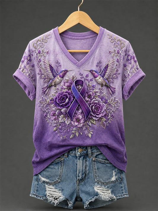 Dames-T-shirt met paarse bloemen- en kolibrieprint ter ondersteuning van het bewustzijn rond Alzheimer, met V-hals