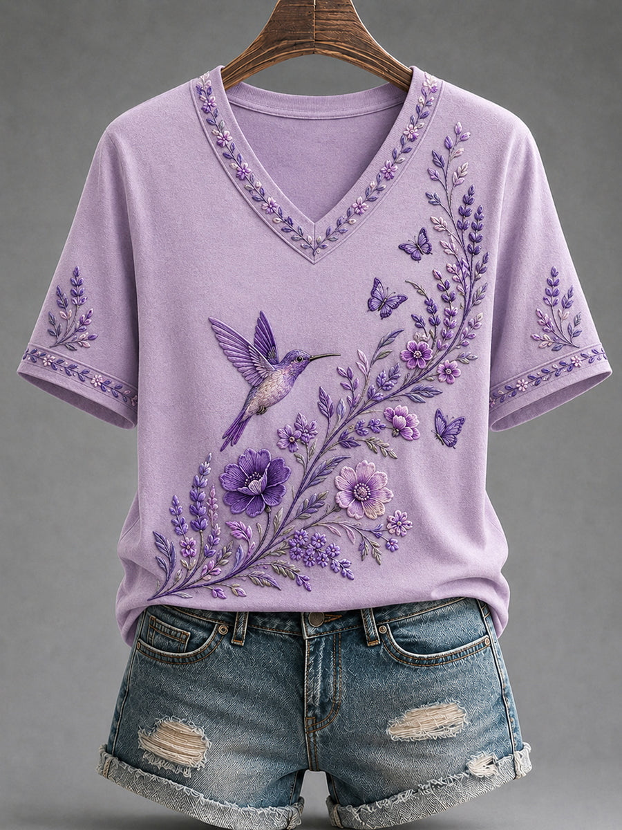 Dames-T-shirt met paarse bloemen- en kolibrieprint ter ondersteuning van het bewustzijn rond Alzheimer, met V-hals