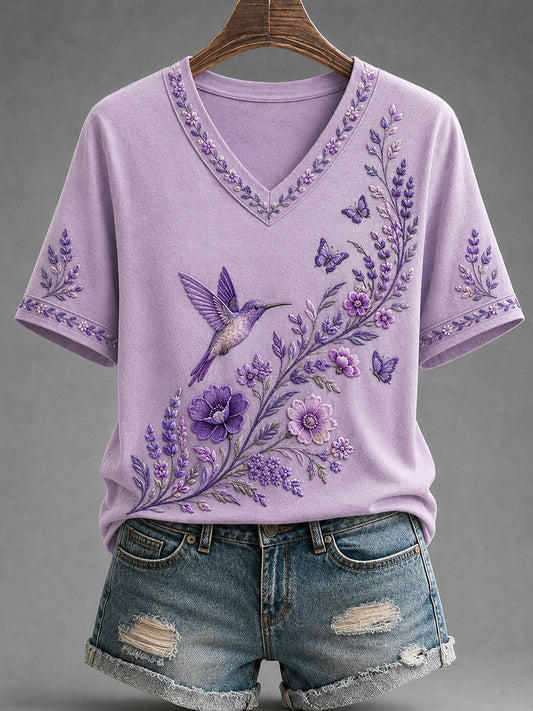 Dames-T-shirt met paarse bloemen- en kolibrieprint ter ondersteuning van het bewustzijn rond Alzheimer, met V-hals
