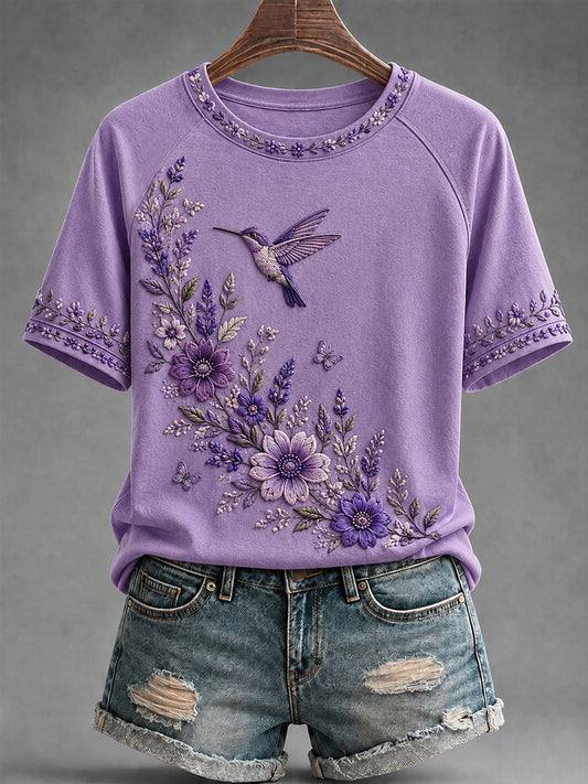 Dames-T-shirt in paars met bloemen- en kolibrieprint ter ondersteuning van het bewustzijn rond Alzheimer
