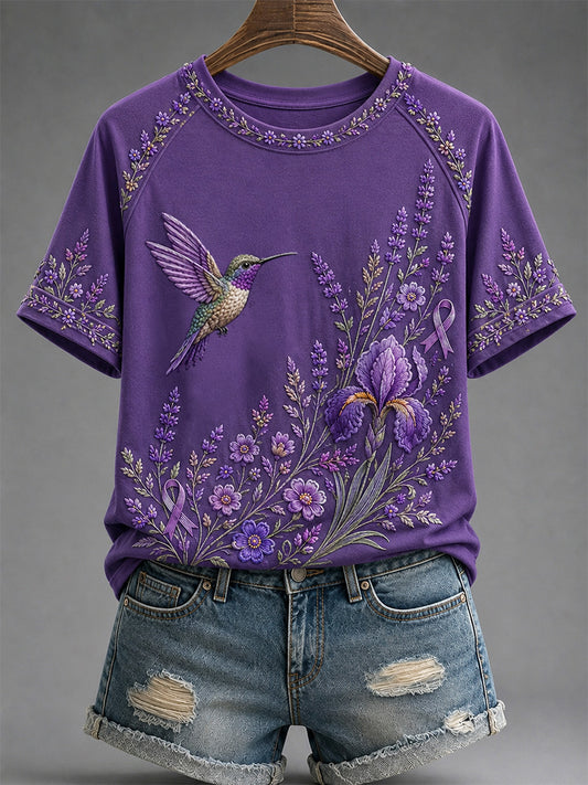 Dames-T-shirt in paars met bloemen- en kolibrieprint ter ondersteuning van het bewustzijn rond Alzheimer