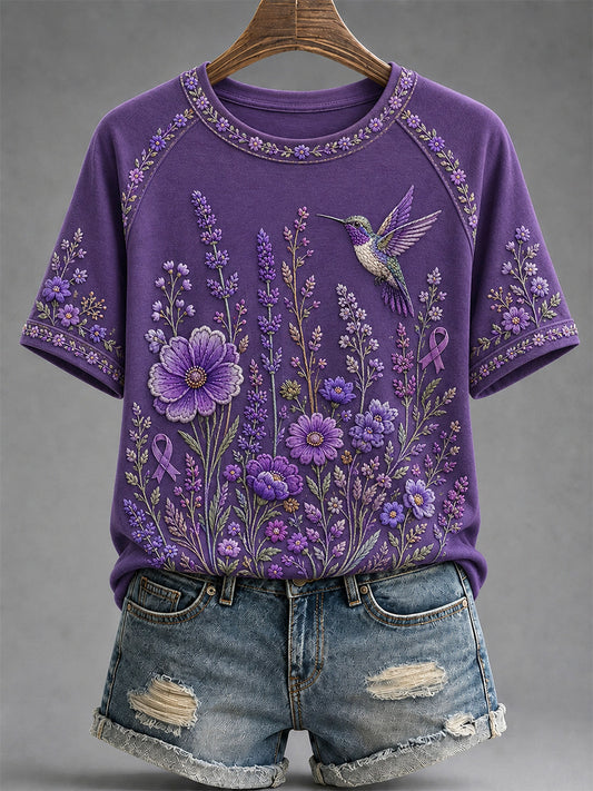 Dames-T-shirt in paars met bloemen- en kolibrieprint ter ondersteuning van het bewustzijn rond Alzheimer