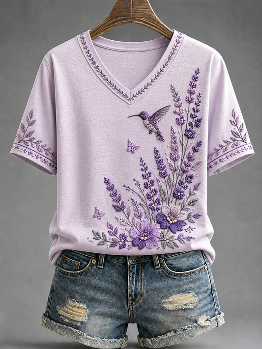 Dames-T-shirt met paarse bloemen- en kolibrieprint ter ondersteuning van het bewustzijn rond Alzheimer, met V-hals