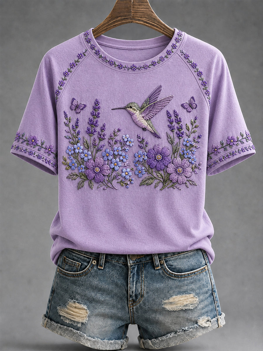 Dames-T-shirt in paars met bloemen- en kolibrieprint ter ondersteuning van het bewustzijn rond Alzheimer
