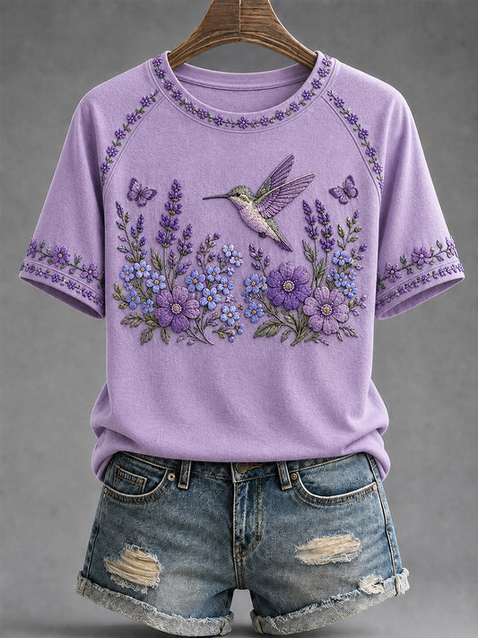 Dames-T-shirt in paars met bloemen- en kolibrieprint ter ondersteuning van het bewustzijn rond Alzheimer