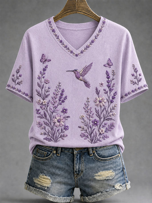 Dames-T-shirt met paarse bloemen- en kolibrieprint ter ondersteuning van het bewustzijn rond Alzheimer, met V-hals