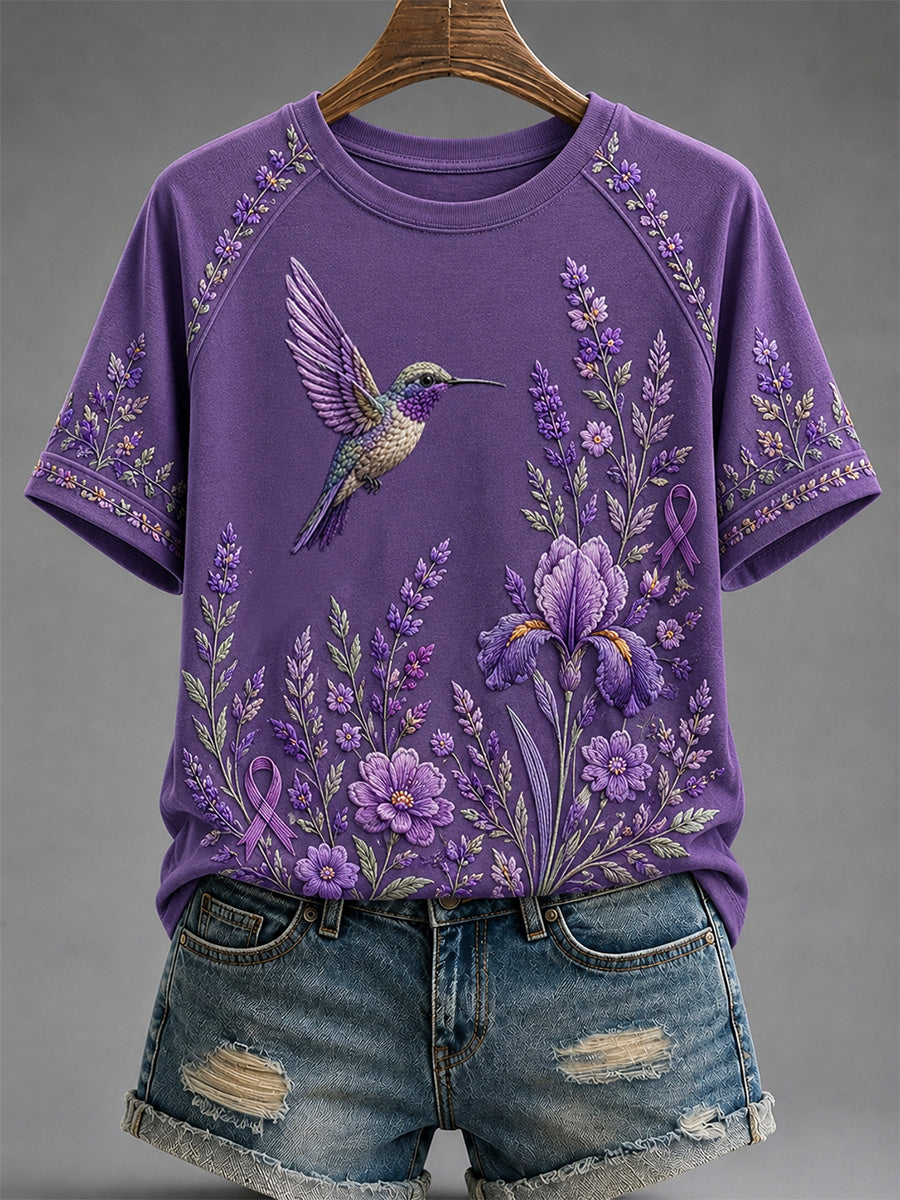 Dames-T-shirt in paars met bloemen- en kolibrieprint ter ondersteuning van het bewustzijn rond Alzheimer