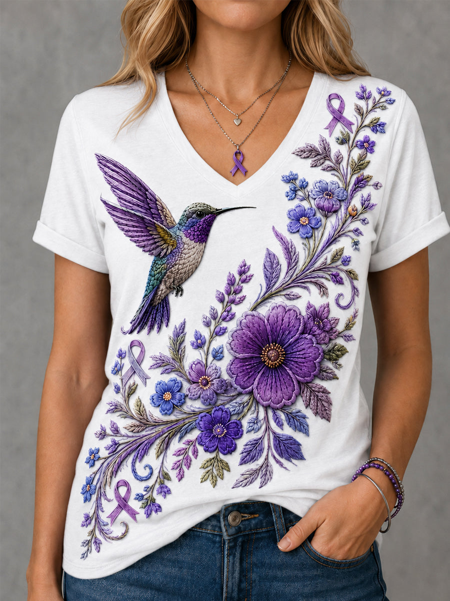 Dames-T-shirt met paarse bloemen- en kolibrieprint ter ondersteuning van het bewustzijn rond Alzheimer, met V-hals