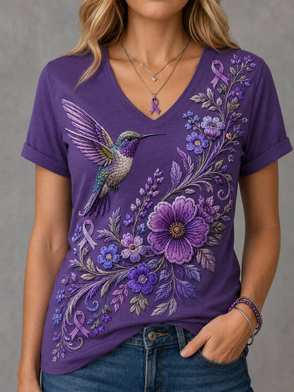 Dames-T-shirt met paarse bloemen- en kolibrieprint ter ondersteuning van het bewustzijn rond Alzheimer, met V-hals