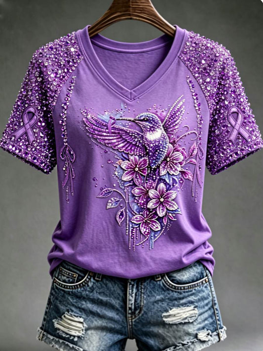 Dames-T-shirt met paarse bloemen- en kolibrieprint ter ondersteuning van het bewustzijn rond Alzheimer, met V-hals