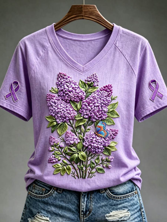 Dames-T-shirt met paarse bloemen- en kolibrieprint ter ondersteuning van het bewustzijn rond Alzheimer, met V-hals