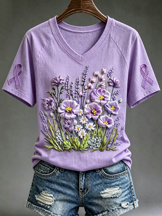 Dames-T-shirt met paarse bloemen- en kolibrieprint ter ondersteuning van het bewustzijn rond Alzheimer, met V-hals
