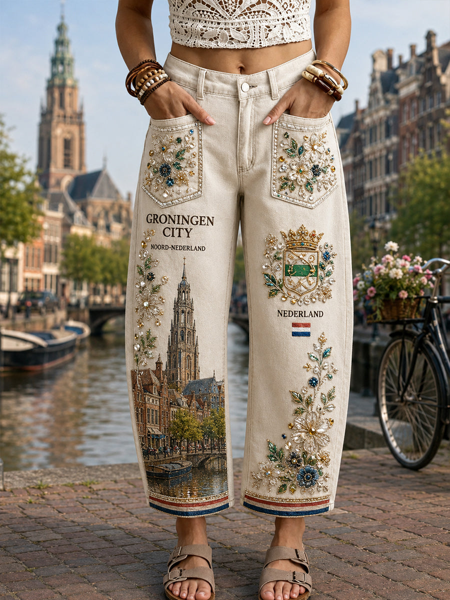 Damesjeans in vintagestijl met prints geïnspireerd door stads souvenirs